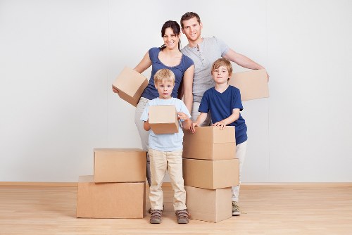 Professional office movers handling business equipment in Harrow