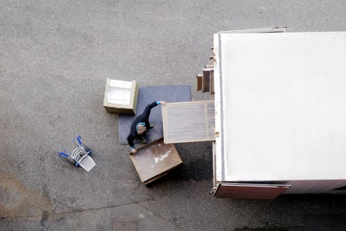 Professional house removals in Harrow with moving van and packed boxes