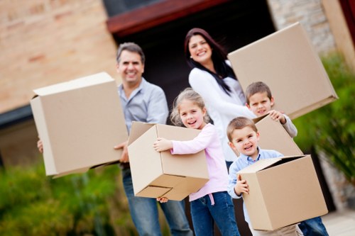 Packed moving boxes ready for flat removals in Harrow